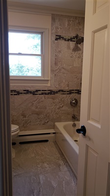 new tiles and flooring in bathroom