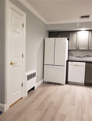 door to renovated kitchen