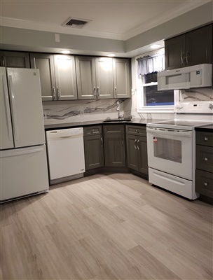 fully finished kitchen with new appliances, sink and cabinets