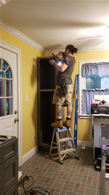 Contractor working on interior of home