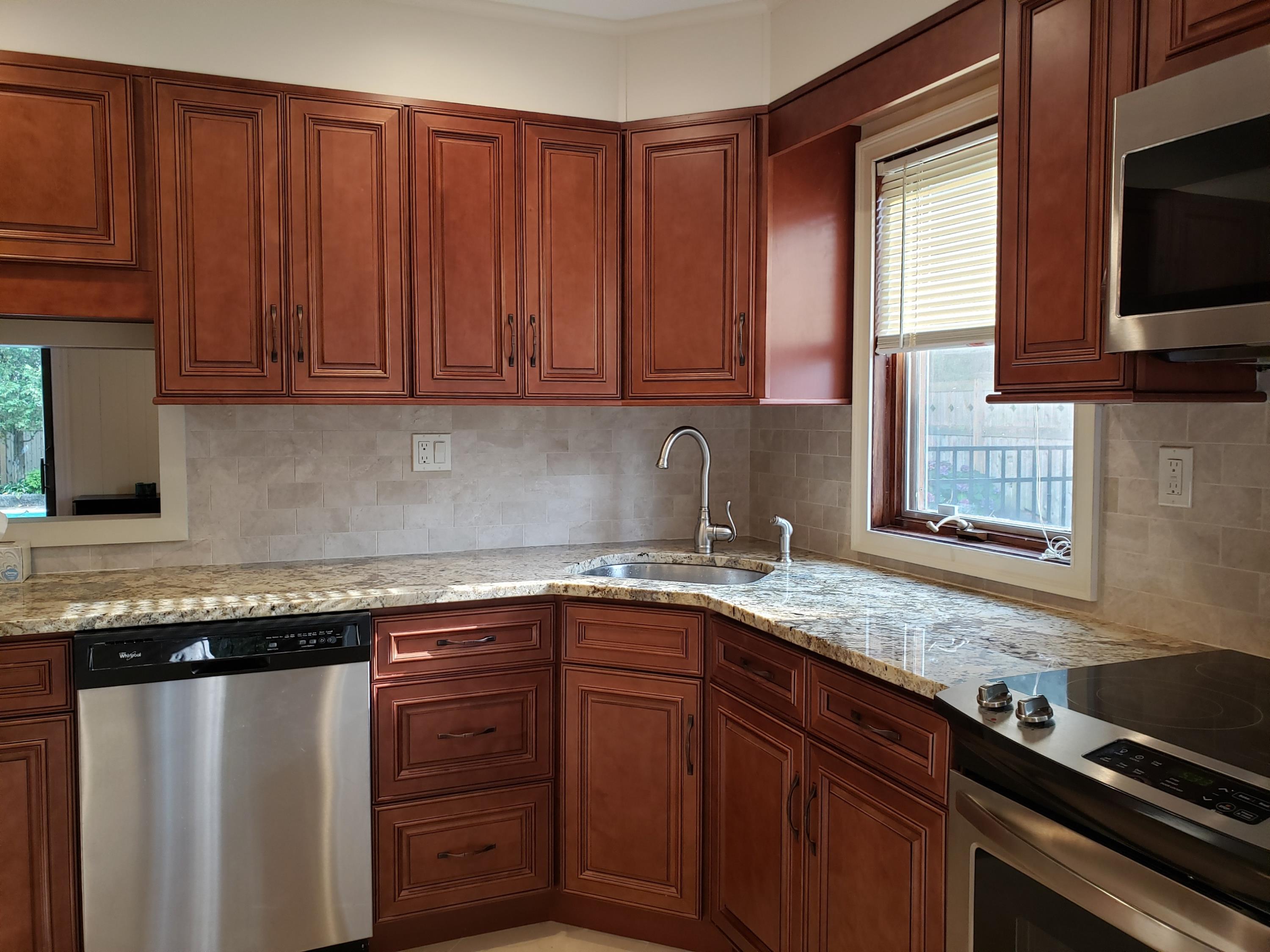 Kitchen renovation with brown cabinets