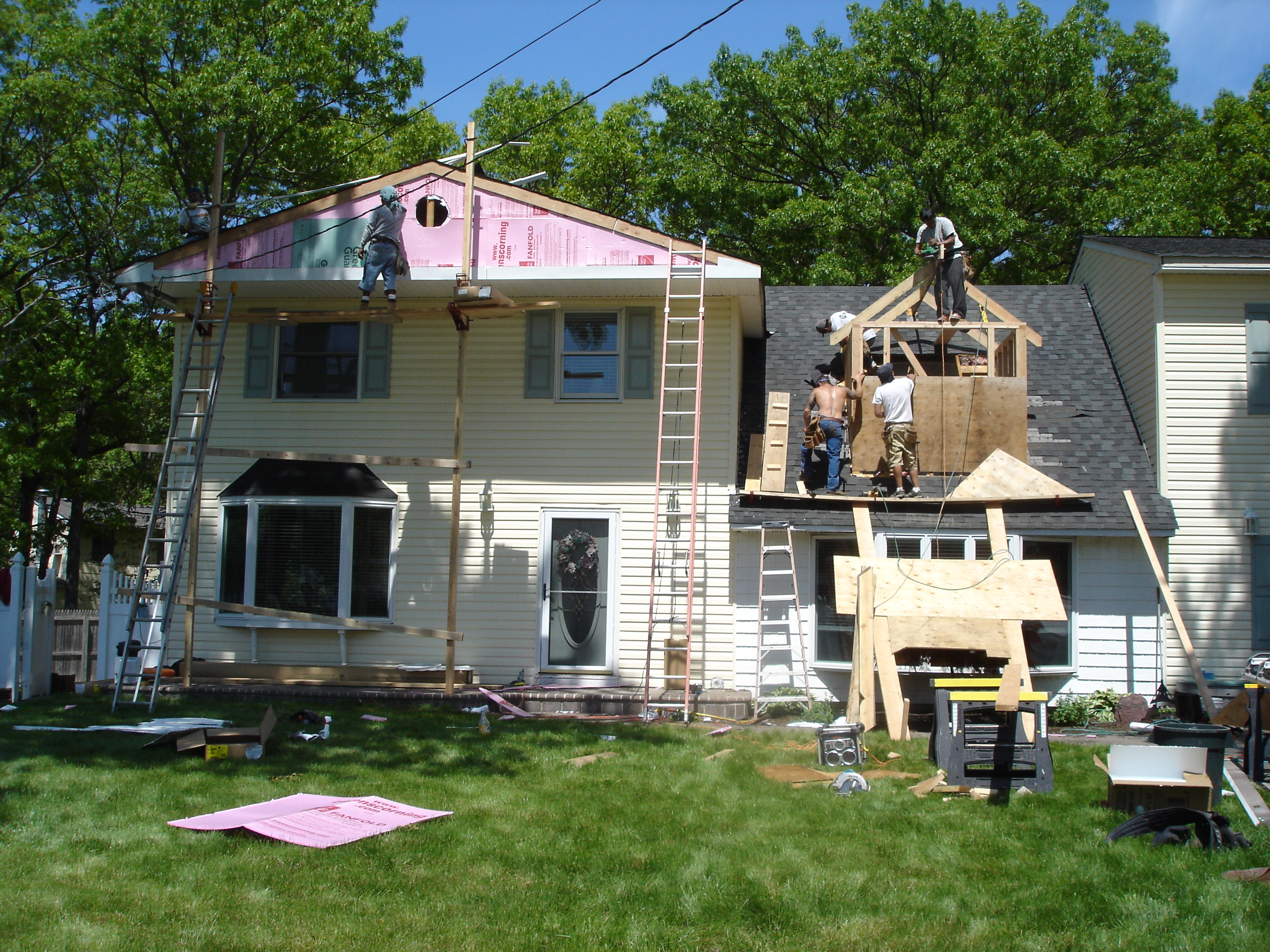 Contractors working on home addition project